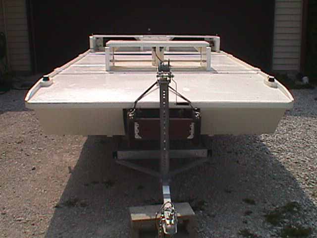 The WizCat 130 foam boat easily loads on to a trailer